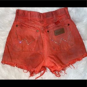 Orange/red Wranglers with rhinestone details